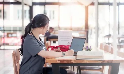 Health Science Student in Library